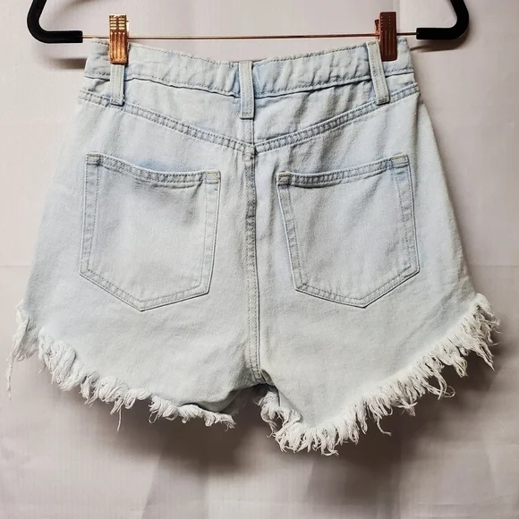 Highest-Rise Light Wash Button Fly Shorts - Picture 4 of 11